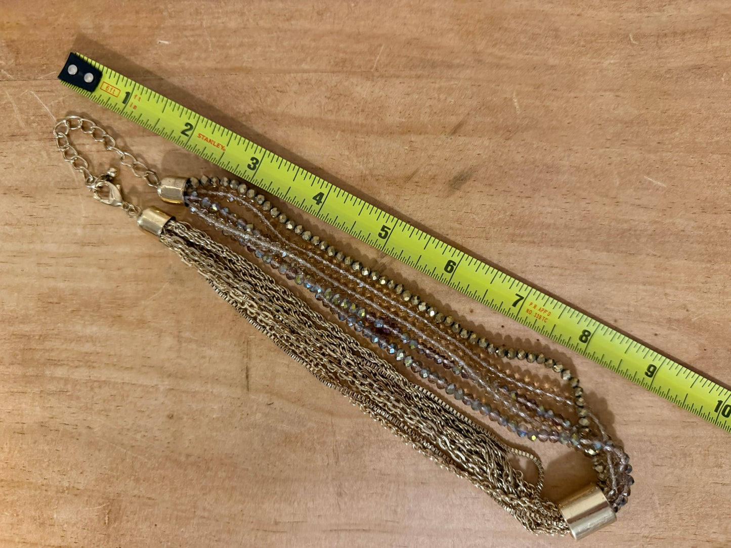 Elegant Multi‑Strand Gold‑Tone Beaded Statement Necklace