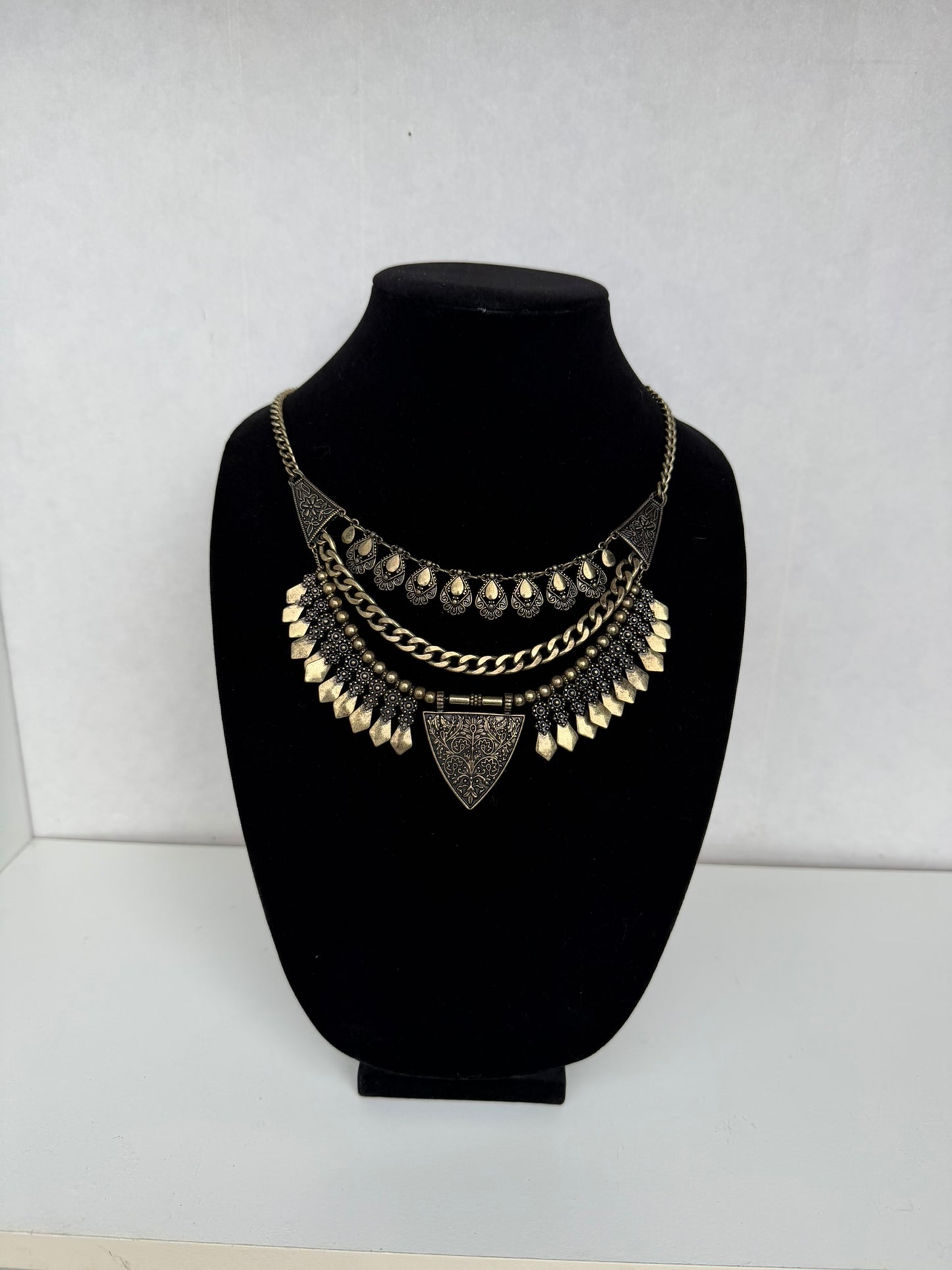 Antique‑Gold Tribal Statement Necklace With Layered Metal Accents