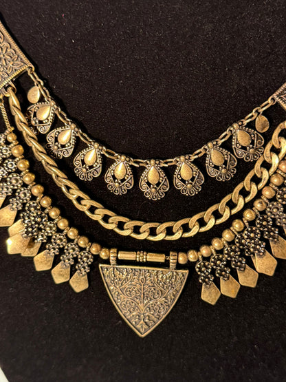 Antique‑Gold Tribal Statement Necklace With Layered Metal Accents