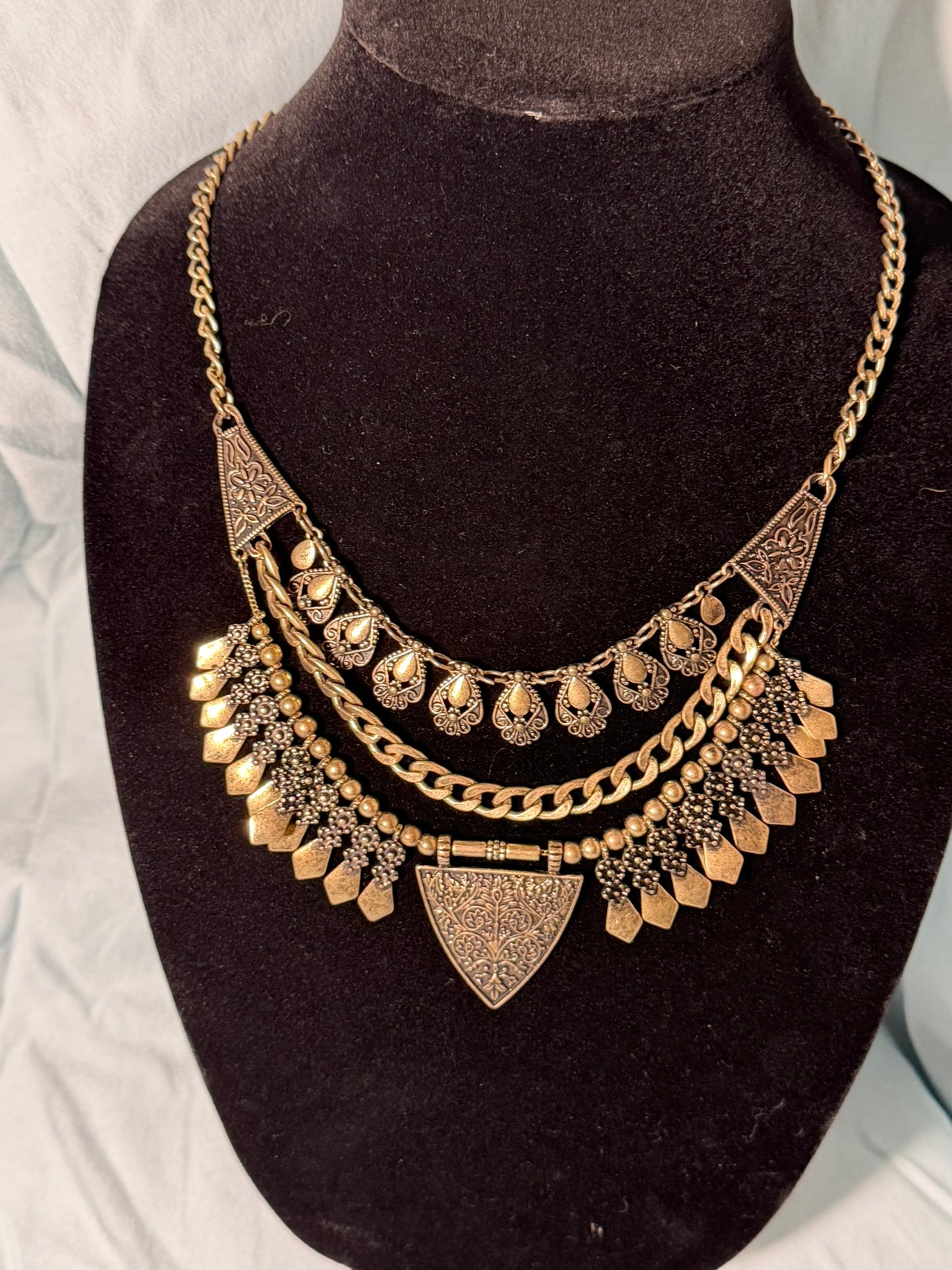 Antique‑Gold Tribal Statement Necklace With Layered Metal Accents