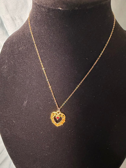 Gold‑Tone Heart Pendant Necklace With Red Center Stone