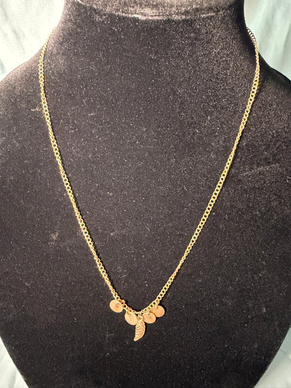 Gold‑Tone Charm Necklace With Mini Disc Accents and Feather Pendant
