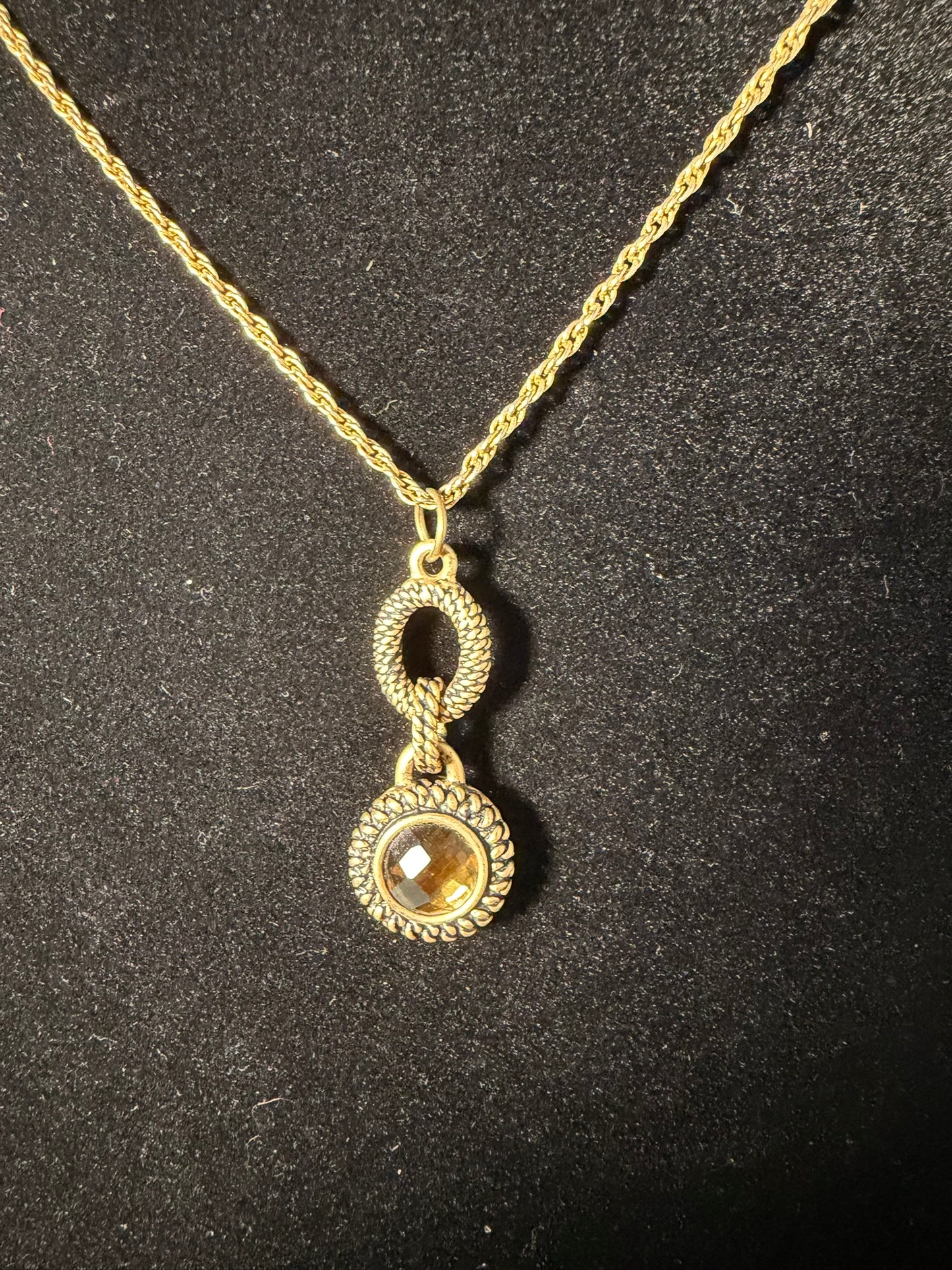 Gold‑Tone Rope Chain Necklace With Two‑Tier Ornate Pendant and Amber‑Colored Center Stone