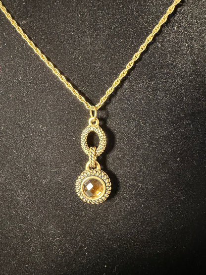 Gold‑Tone Rope Chain Necklace With Two‑Tier Ornate Pendant and Amber‑Colored Center Stone