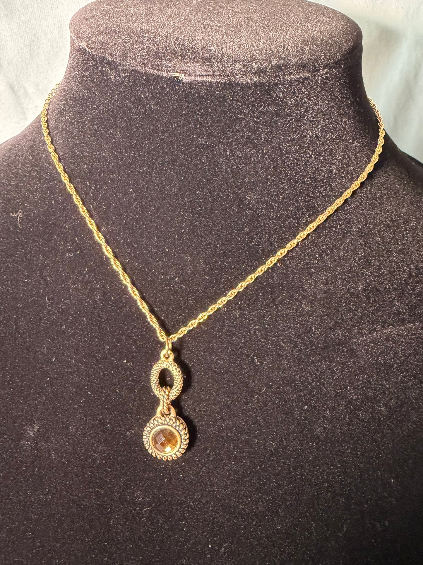 Gold‑Tone Rope Chain Necklace With Two‑Tier Ornate Pendant and Amber‑Colored Center Stone