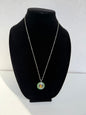 Green Enamel Medallion Pendant Necklace With Gold‑Tone Buddha Figure &amp; Silver Filigree Accents
