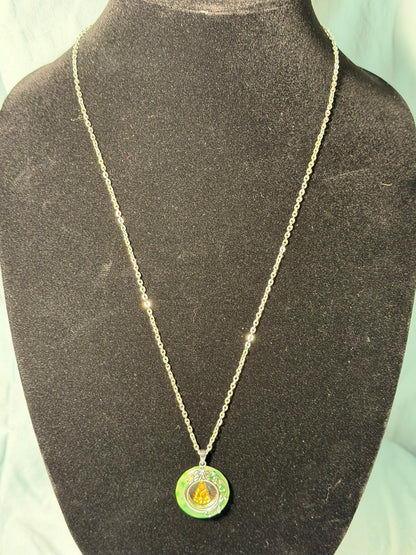 Green Enamel Medallion Pendant Necklace With Gold‑Tone Buddha Figure &amp; Silver Filigree Accents