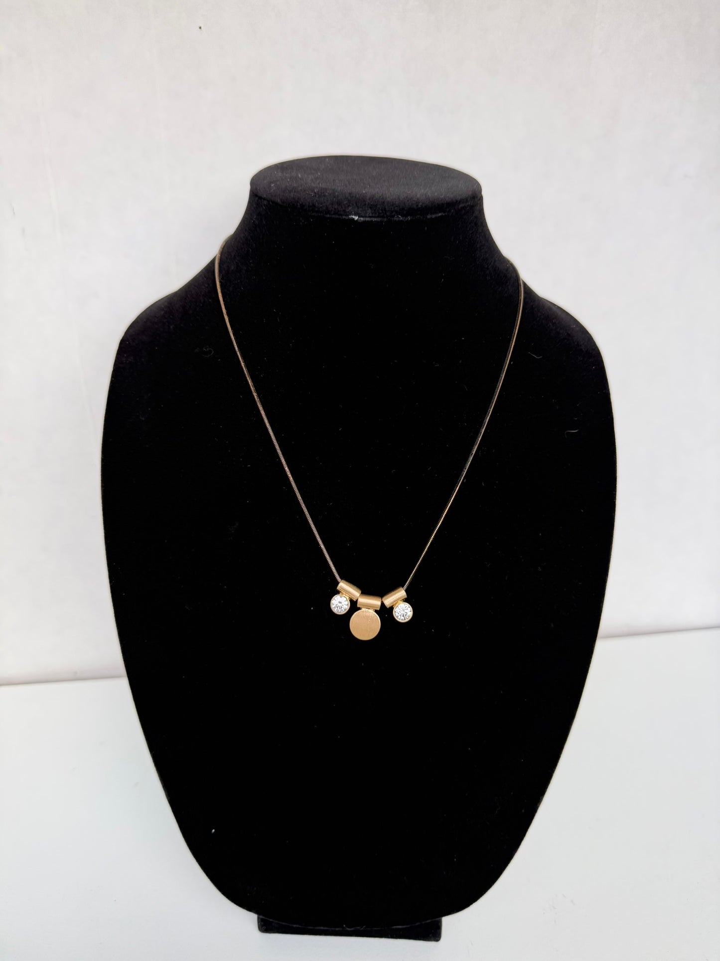 Minimalist Gold‑Tone Necklace With Trio of Modern Charms (Disc + Two Crystal Drops)