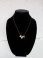 Minimalist Gold‑Tone Necklace With Trio of Modern Charms (Disc + Two Crystal Drops)