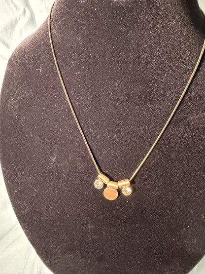 Minimalist Gold‑Tone Necklace With Trio of Modern Charms (Disc + Two Crystal Drops)
