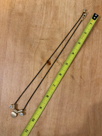 Minimalist Gold‑Tone Necklace With Trio of Modern Charms (Disc + Two Crystal Drops)